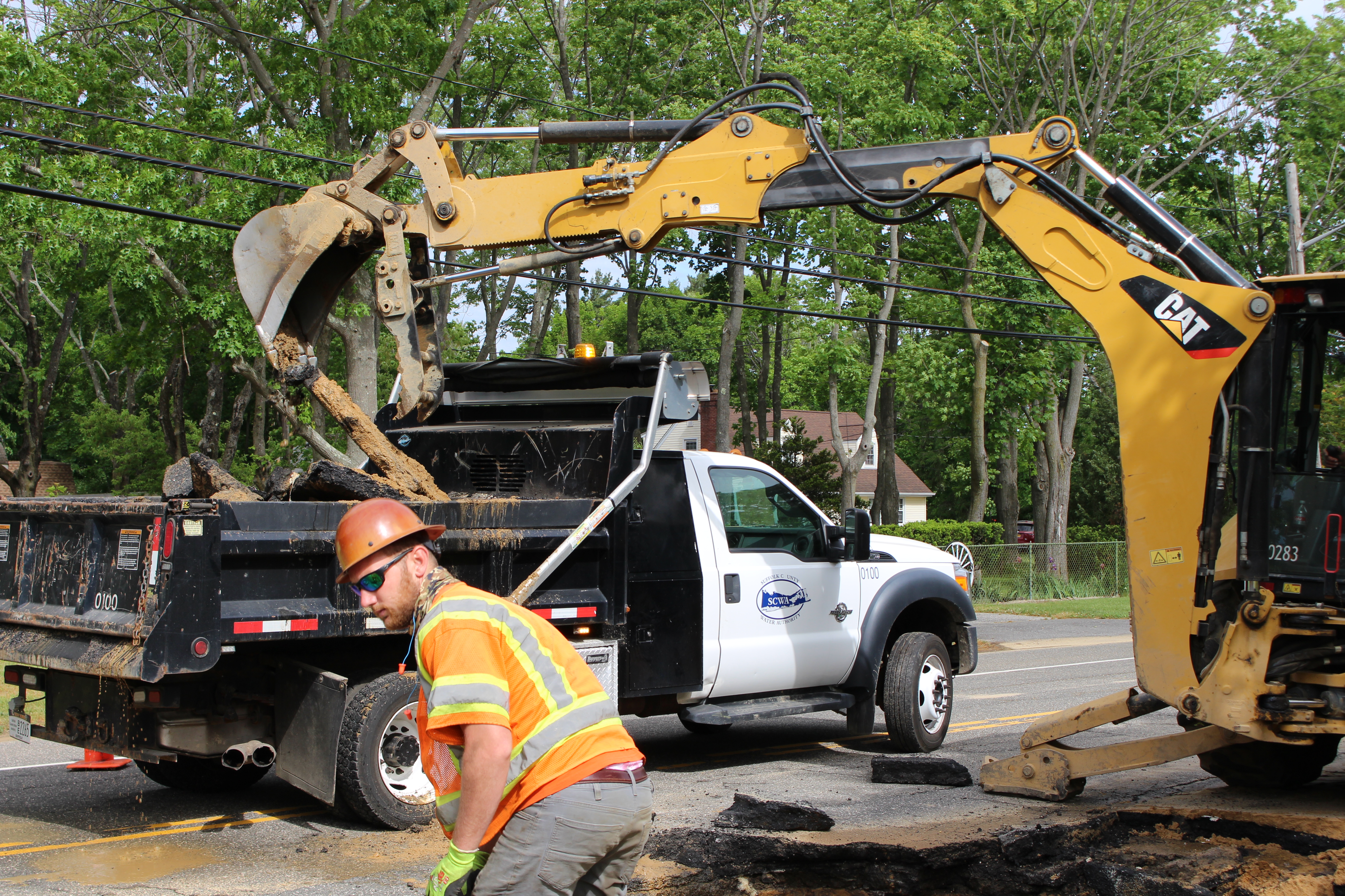 Excavated trench with new water main pipe
